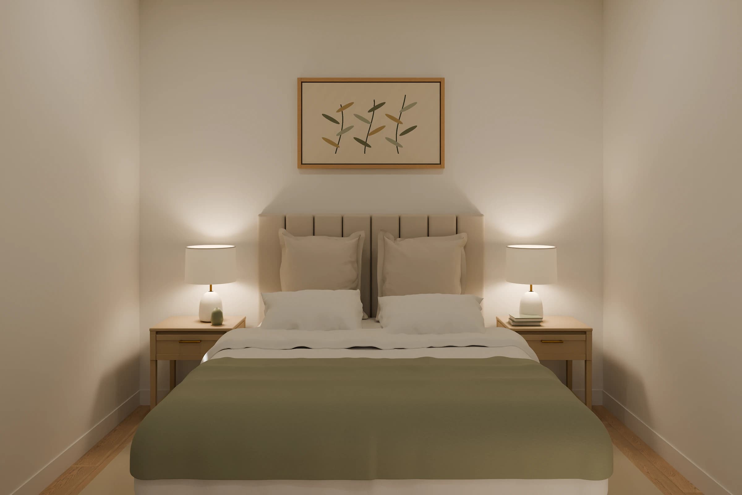 Rendering of the One Bedroom ADU bedroom, a bed with a channel-stitched upholstered headboard, white bedding and a sage throw between two light wood nightstands with white lamps, under a framed leaf print